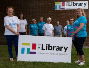 The memory walk team standing in front of the Library.